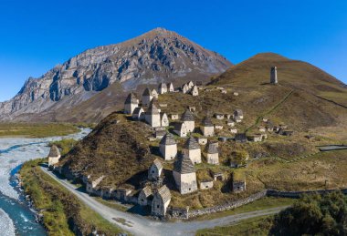 Dargavs, the medieval city of the dead in the mountains of the C clipart