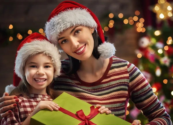 Mother and daughter exchanging gifts — Stock Photo, Image