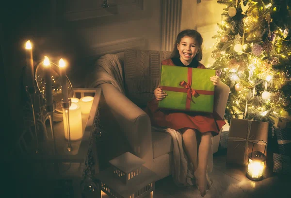 Girl with Christmas present — Stock Photo, Image