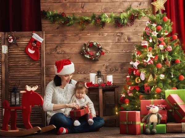 Mother and baby on Christmas — Stock Photo, Image