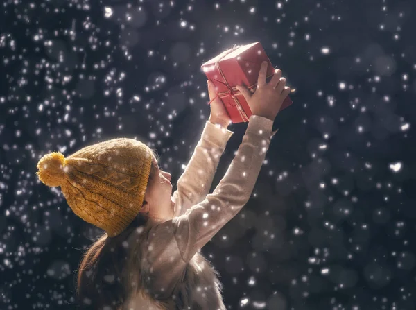 Kid on dark background — Stock Photo, Image