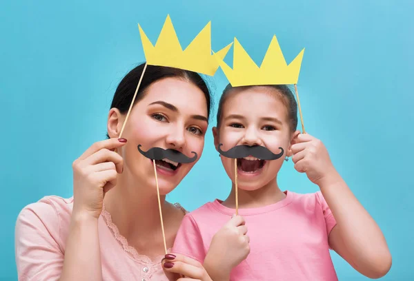 Funny family on background of blue wall — Stock Photo, Image