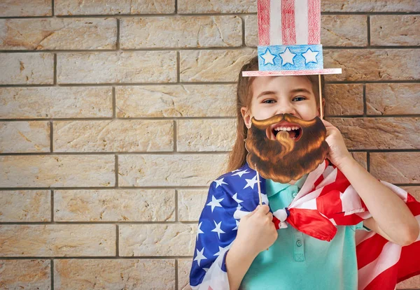 Menina com bandeira americana — Fotografia de Stock