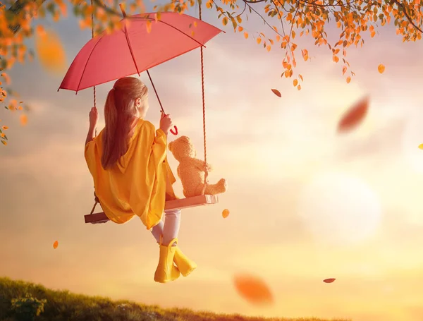 Girl on swing — Stock Photo, Image