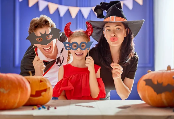 family celebrating Halloween