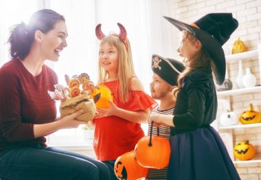 family celebrating Halloween