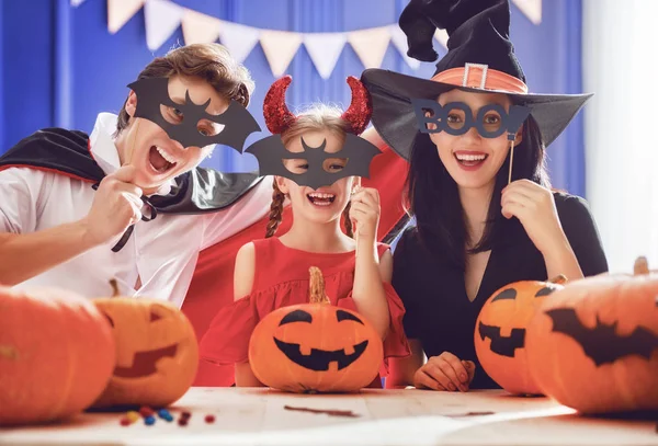 family celebrating Halloween