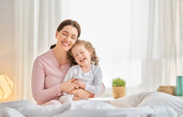 Girl and her mother enjoy sunny morning — Stock Photo, Image