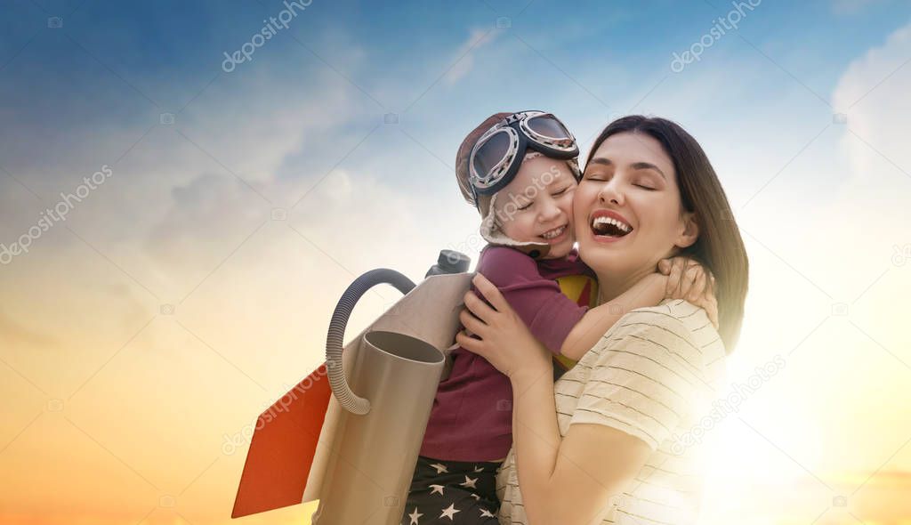 mother and child in astronaut costume