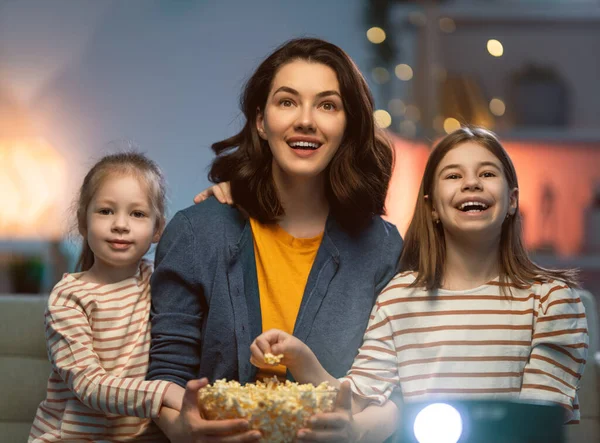 Happy Family Watching Projector Movies Popcorn Evening Home Mother Daughters — Stock Photo, Image