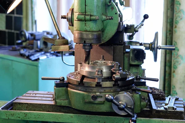 Metal head of machine on factory