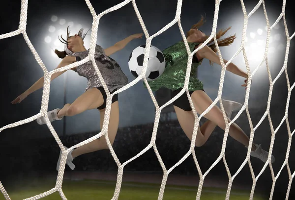 Young woman playing soccer — Stock Photo, Image