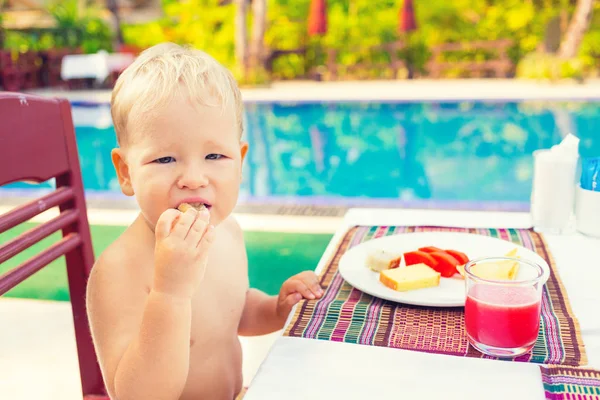 Child has a breakfast — Stock Photo, Image