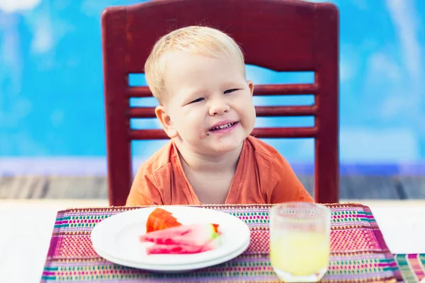 Child has a breakfast — Stock Photo, Image