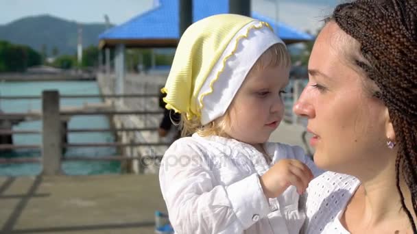 Woman with daughter on pier — Stock Video