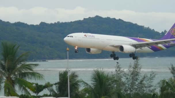 Airbus 330 approaching over ocean — Stock Video