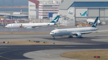 Uluslararası Havaalanı, Hong Kong 'dan kalkmadan önce uçaktan dönüş.