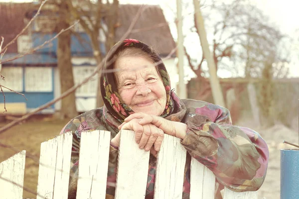 An Old Woman in a Scarf. — Stock Photo, Image