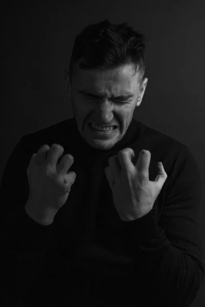 Male Black And White Emotional Portrait. Emotions and Their Living