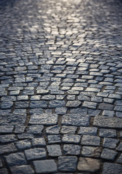 Bakgrund av gamla kullersten trottoaren — Stockfoto