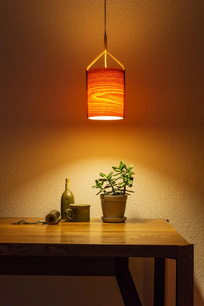 Wooden lamp night light over the table — 图库照片