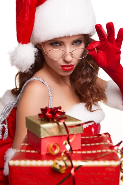 Mladá sexy žena v červené vánoční santa claus holiday šaty — Stock fotografie