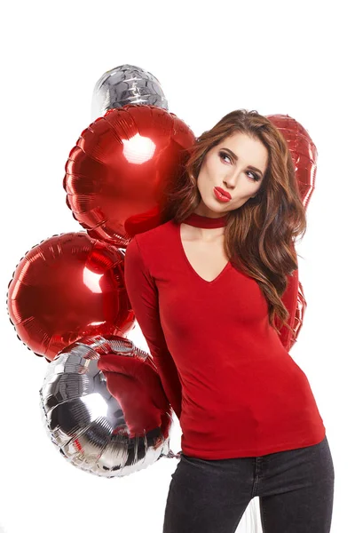 Beautiful girl in the studio with balloons — Stock Photo, Image