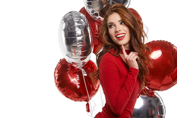 Schönes Mädchen im Atelier mit Luftballons — Stockfoto
