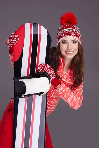 Frau mit einem Snowboard — Stockfoto