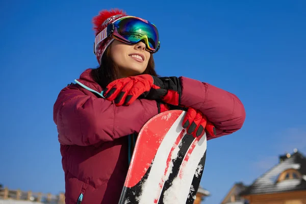 Mulher desportiva snowboarder — Fotografia de Stock