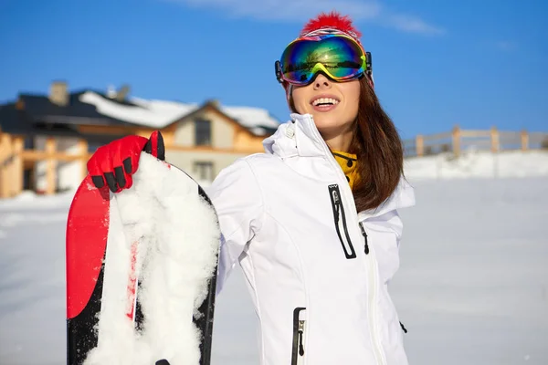 Mulher desportiva snowboarder — Fotografia de Stock