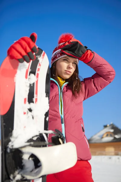 Snowboardåkare kvinna porträtt — Stockfoto