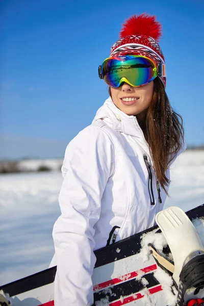 Donna sportiva snowboarder — Foto Stock