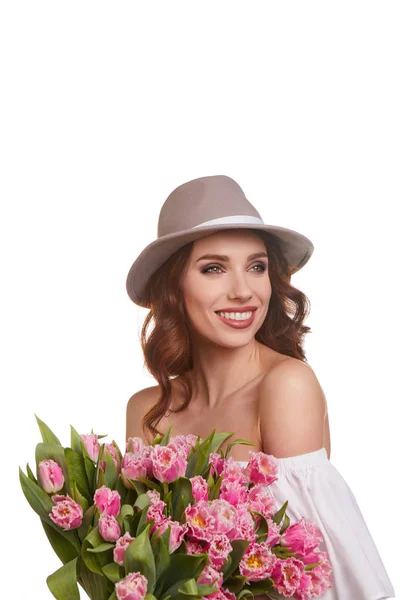 Beautiful girl in hat with flowers — Stock Photo, Image