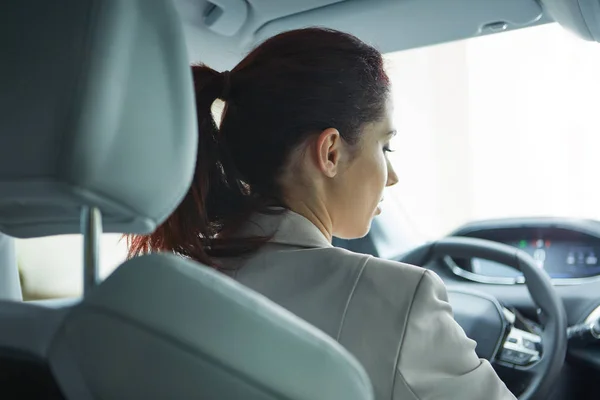 Business woman driving her new  car — Stock Photo, Image