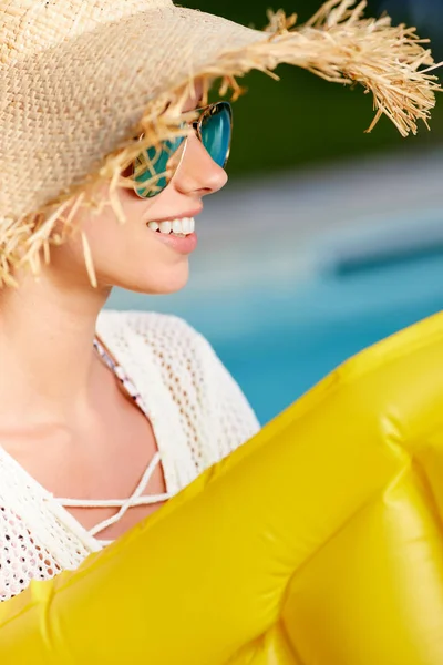 Girl floating on beach mattress — Stock Photo, Image