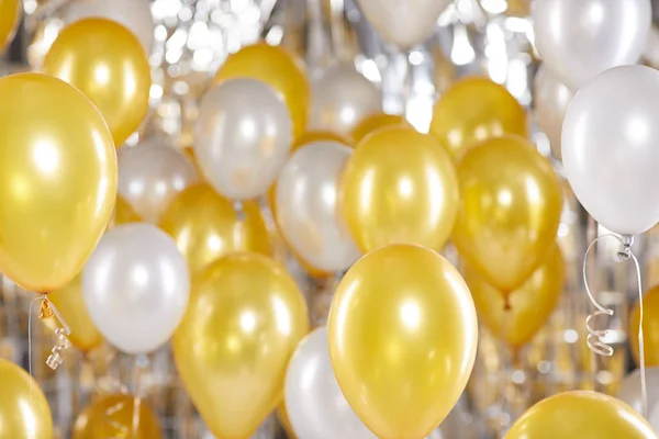 Golden and silver balloons background. New Year concept