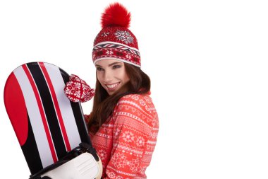 Bir snowboard studio tutan Kış elbise giyen kadın