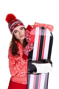 Bir snowboard studio tutan Kış elbise giyen kadın