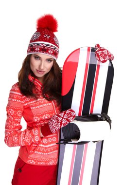 Bir snowboard studio tutan Kış elbise giyen kadın