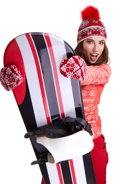 Bir snowboard studio tutan Kış elbise giyen kadın