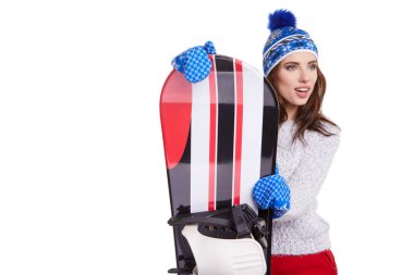 Bir snowboard studio tutan Kış elbise giyen kadın