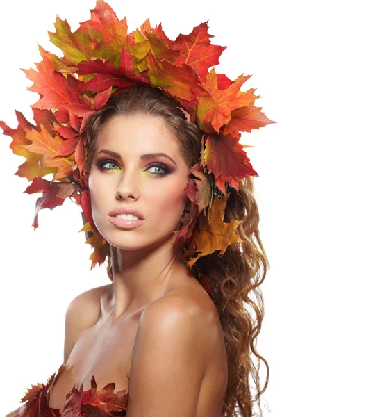 Autumn woman dressed in red leaves — Stock Photo, Image