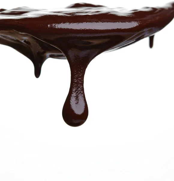 Горячий шоколадный поток на белом — стоковое фото
