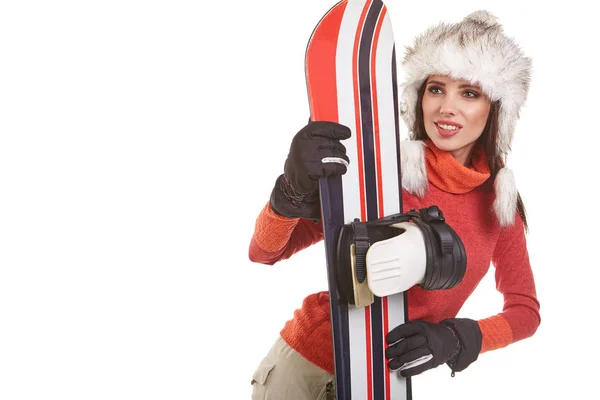 Una hermosa mujer sexy con una tabla de snowboard en el estudio — Foto de Stock