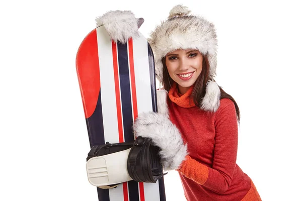 Uma bela mulher sexy com um snowboard no estúdio — Fotografia de Stock
