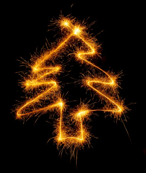 Christmas tree made by sparkler on a black — Stock Photo, Image