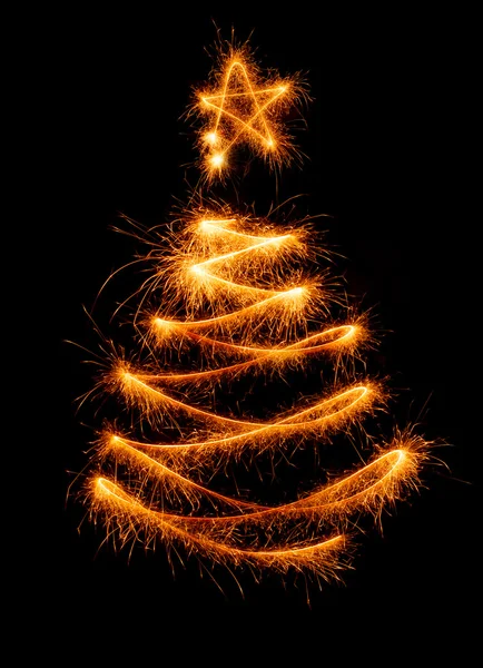 Albero di Natale fatto da sparkler su un nero — Foto Stock