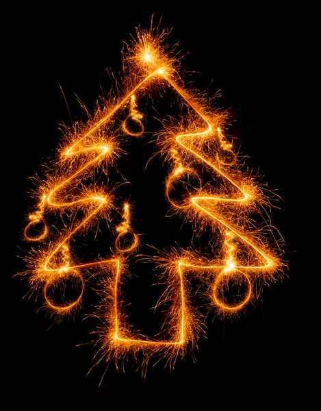 Árbol de Navidad hecho por luces de Bengala en un negro — Zdjęcie stockowe