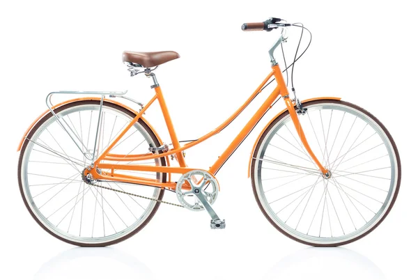Elegante donna arancione bicicletta isolata su bianco — Foto Stock